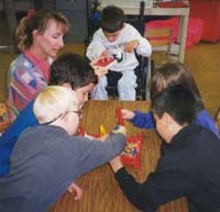 Photo of younger students working together